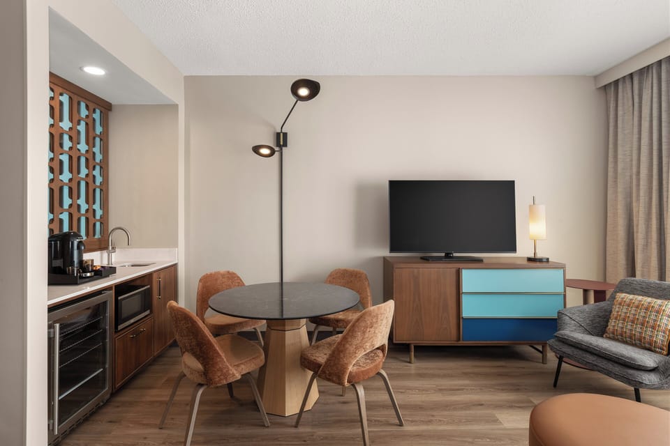Suite, 1 Bedroom (with Living Area) | In-room safe, desk, blackout drapes, iron/ironing board