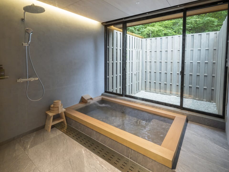 Separate tub and shower, spring water tub, designer toiletries
