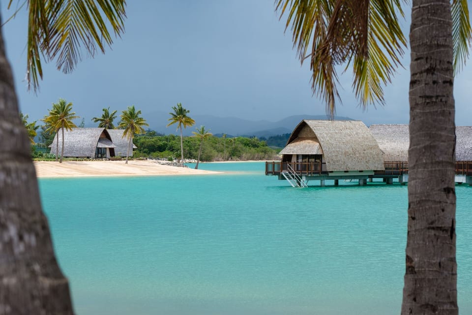 On the beach, white sand, beach towels, scuba diving