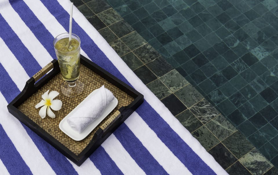 Outdoor pool, open 7 AM to 9 PM, sun loungers