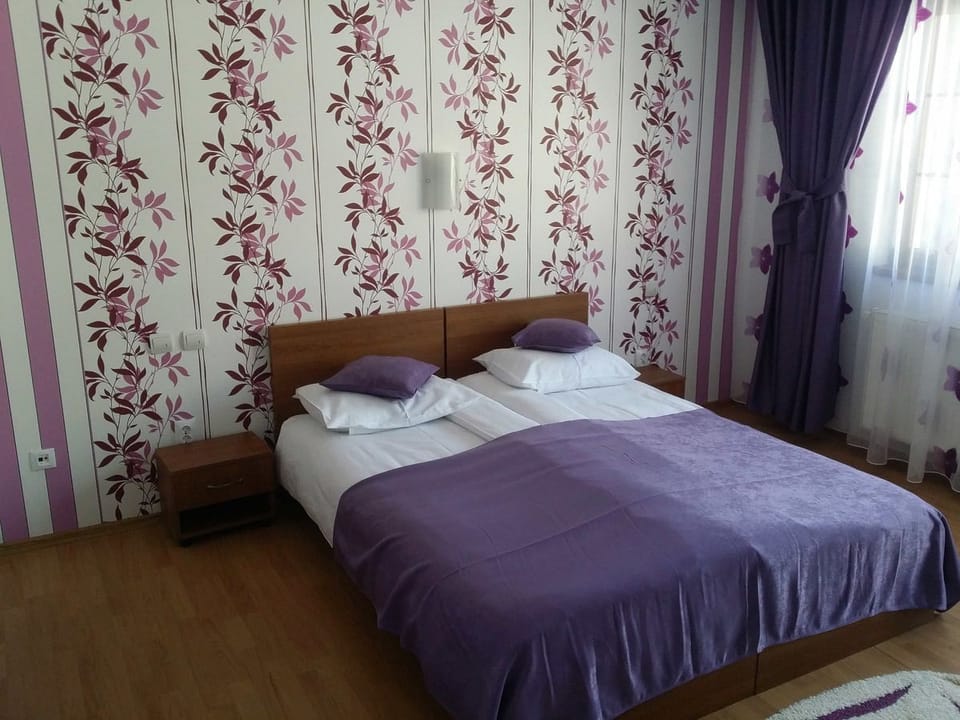 Minibar, desk, blackout drapes, iron/ironing board