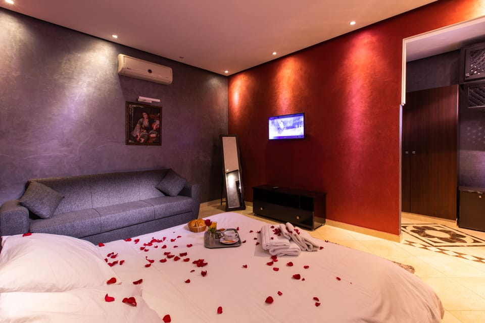 Family Room | Premium bedding, blackout drapes, free WiFi, bed sheets