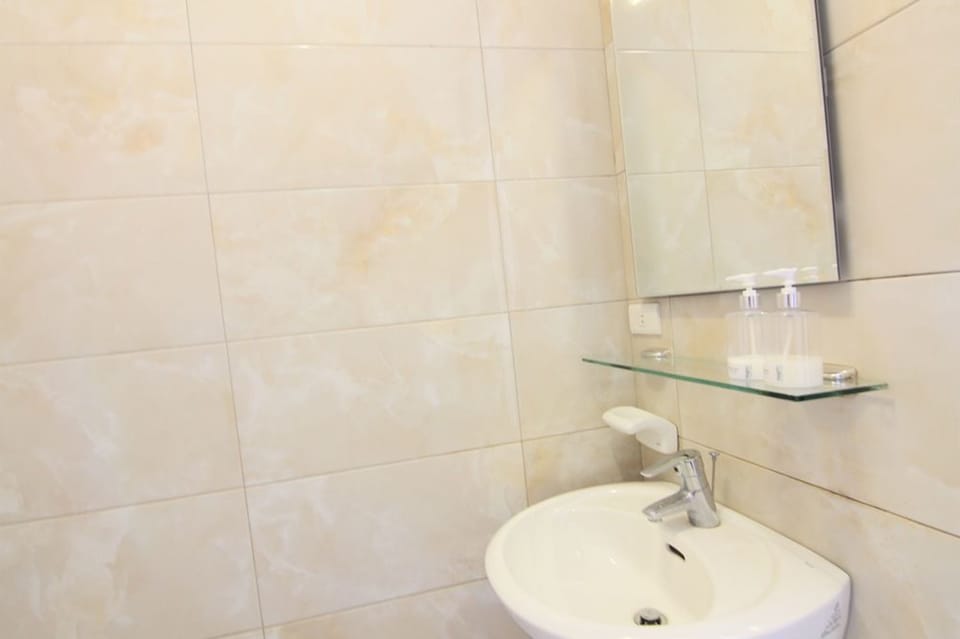 Shower, free toiletries, hair dryer, slippers