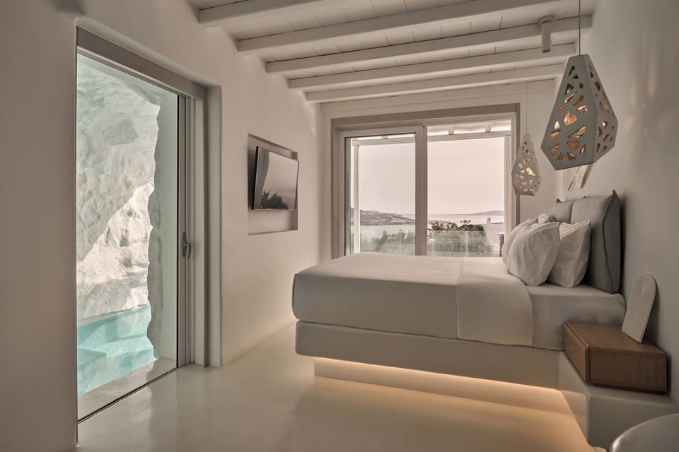 Ovea Cave Pool Villa | Premium bedding, down comforters, memory foam beds, minibar