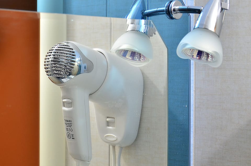 Shower, free toiletries, slippers, towels