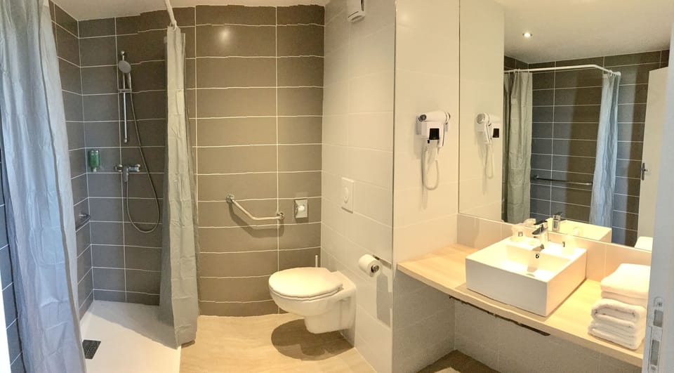 Shower, free toiletries, hair dryer, towels