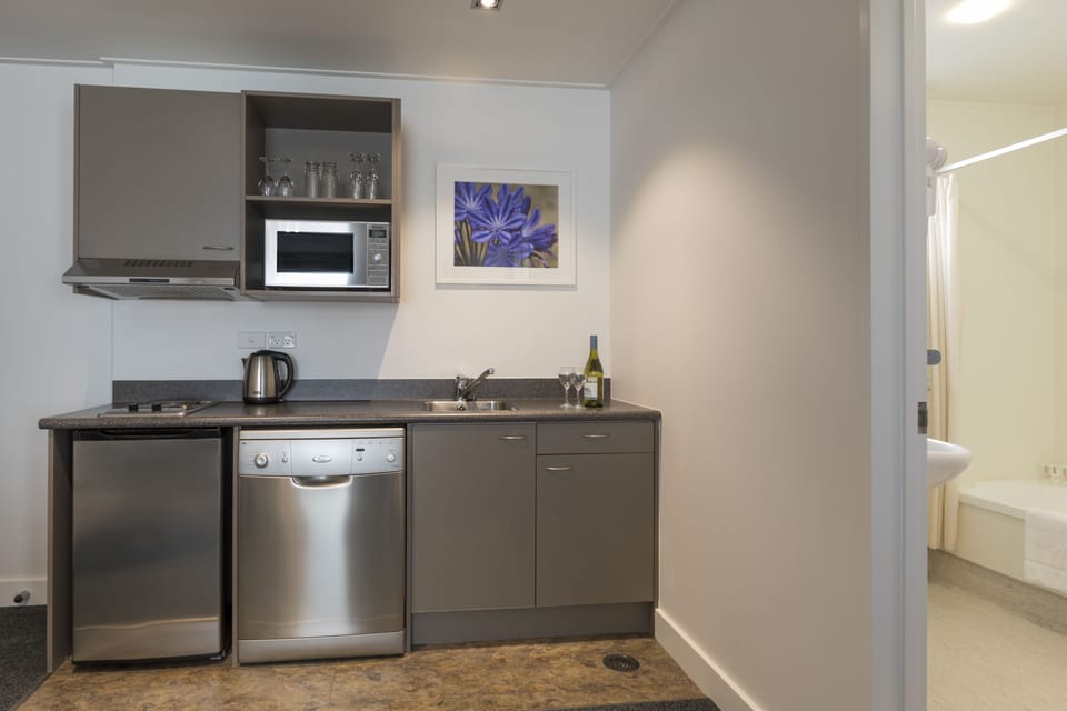 Fridge, microwave, cookware/dishes/utensils