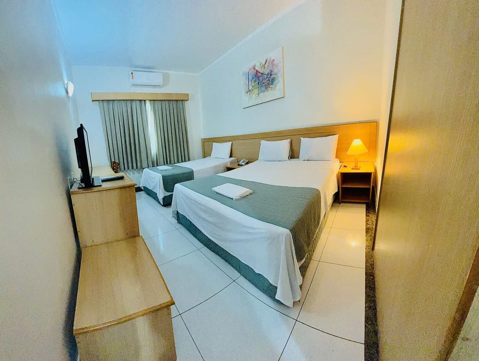 Executive Double Room | Minibar, in-room safe, individually furnished, desk