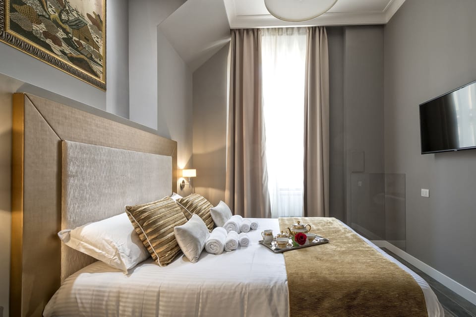 Double Room, City View | Pillowtop beds, in-room safe, desk, iron/ironing board