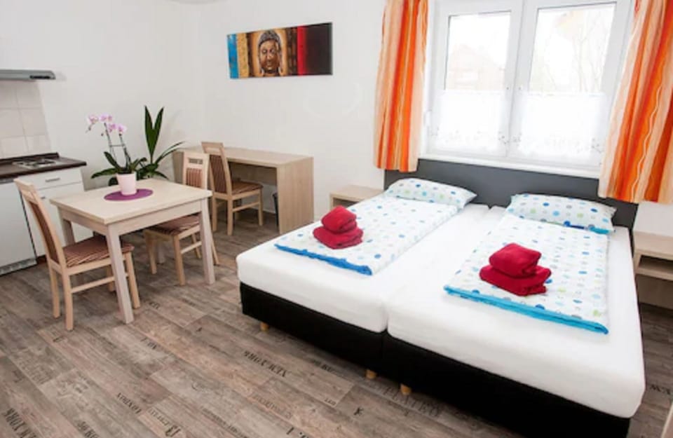 Double Room, Kitchenette | Desk, blackout drapes, iron/ironing board, rollaway beds