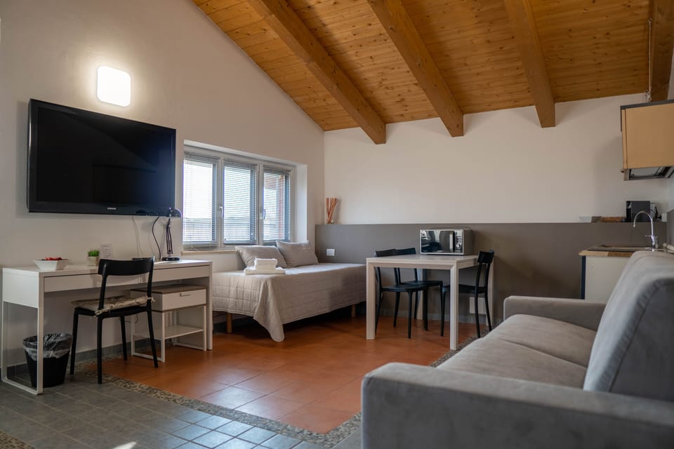 Superior Studio Suite, Tower | Living area | Flat-screen TV