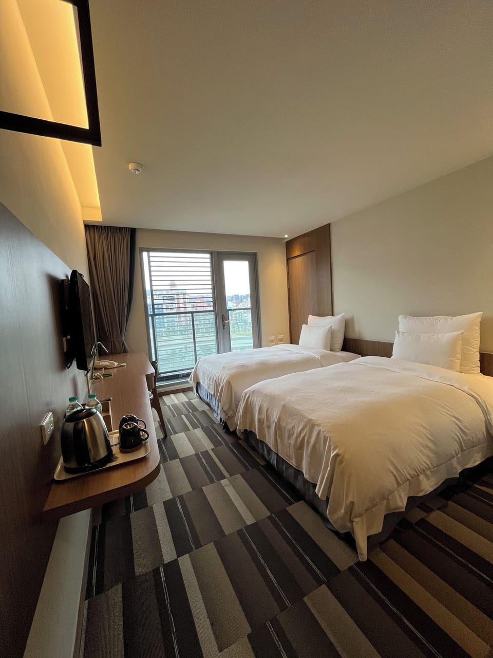 Down comforters, desk, blackout drapes, soundproofing