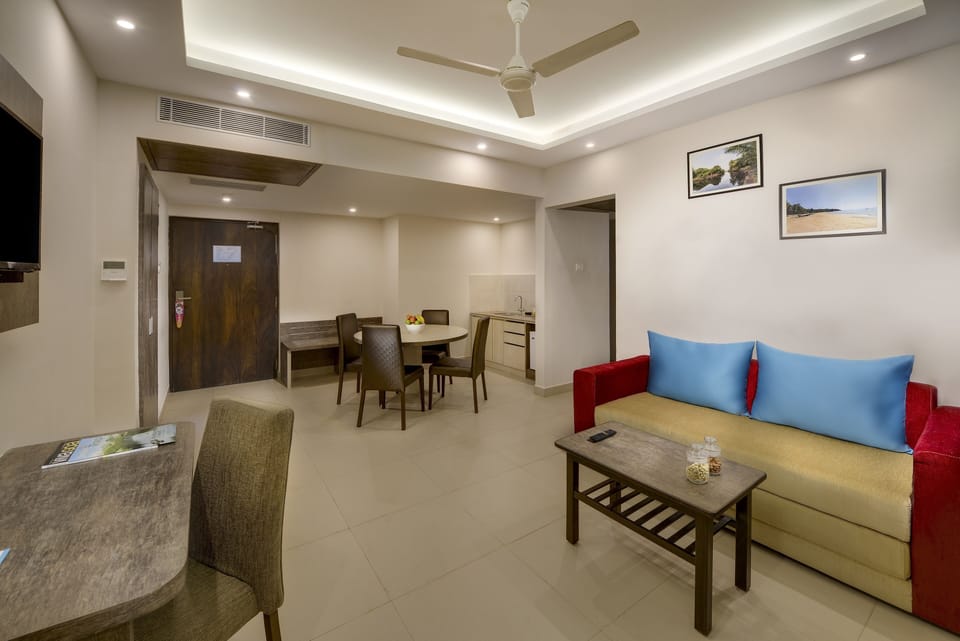 Privilege Suite with Balcony | Living area | Flat-screen TV