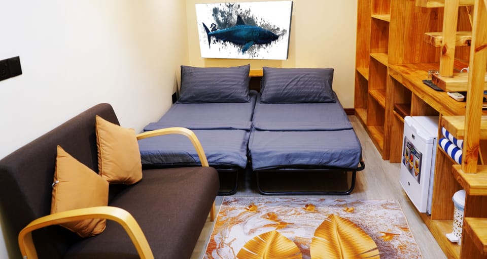Family Room | 1 bedroom, premium bedding, minibar, in-room safe