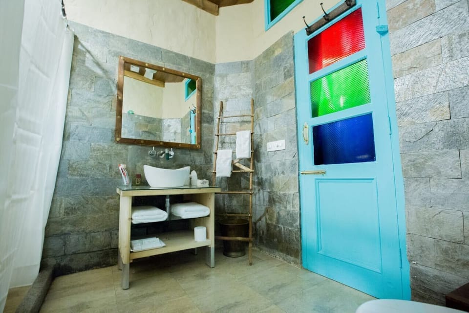 Shower, free toiletries, hair dryer, slippers
