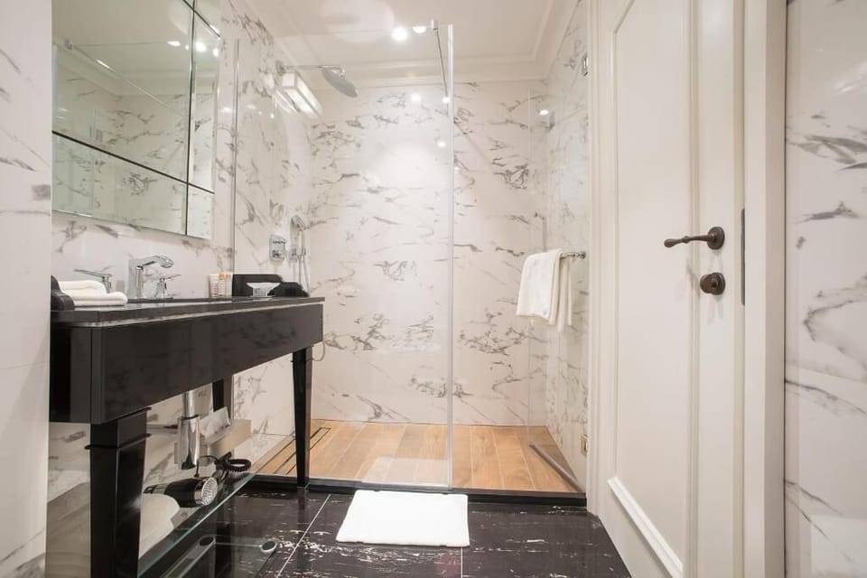 Shower, free toiletries, hair dryer, bathrobes