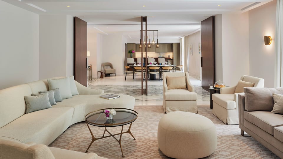 Premium bedding, down comforters, free minibar items, in-room safe