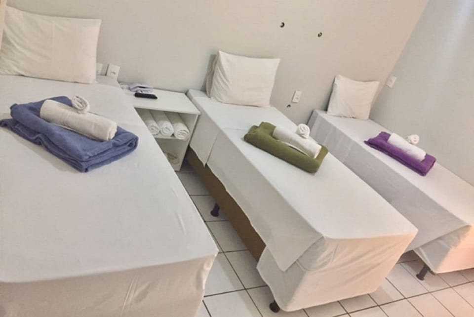 Standard Triple Room | Individually furnished, blackout drapes, free WiFi, wheelchair access