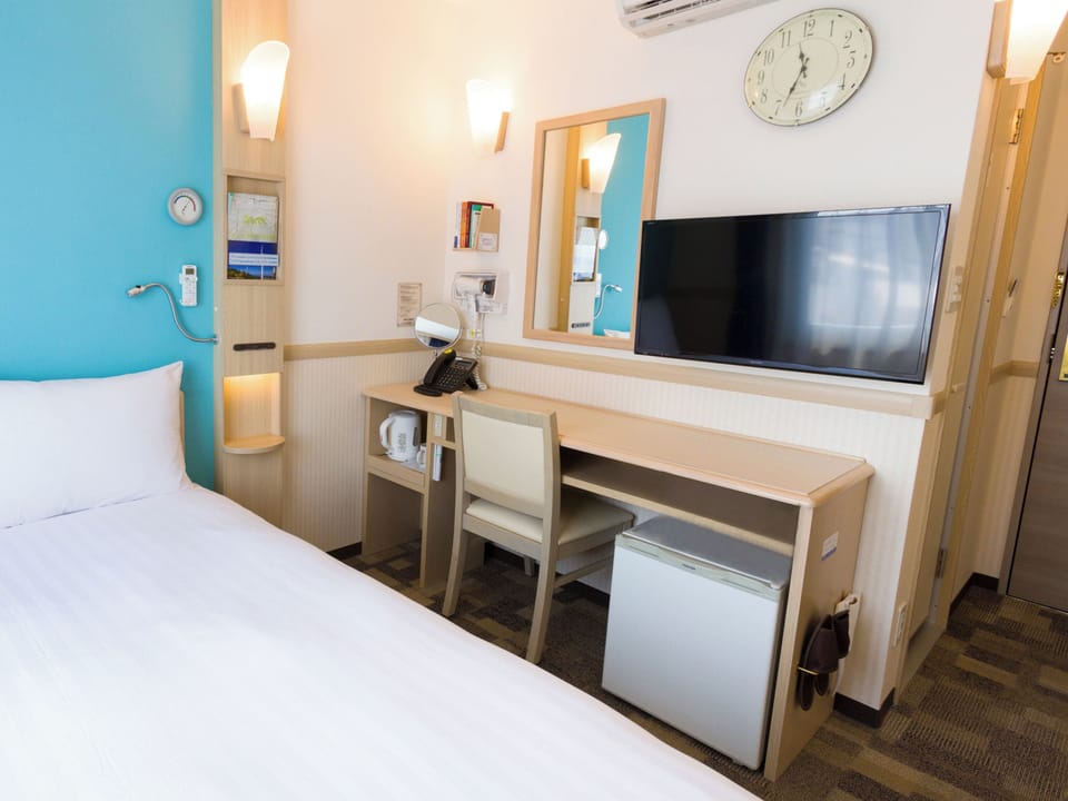 Desk, WiFi (free), bed sheets