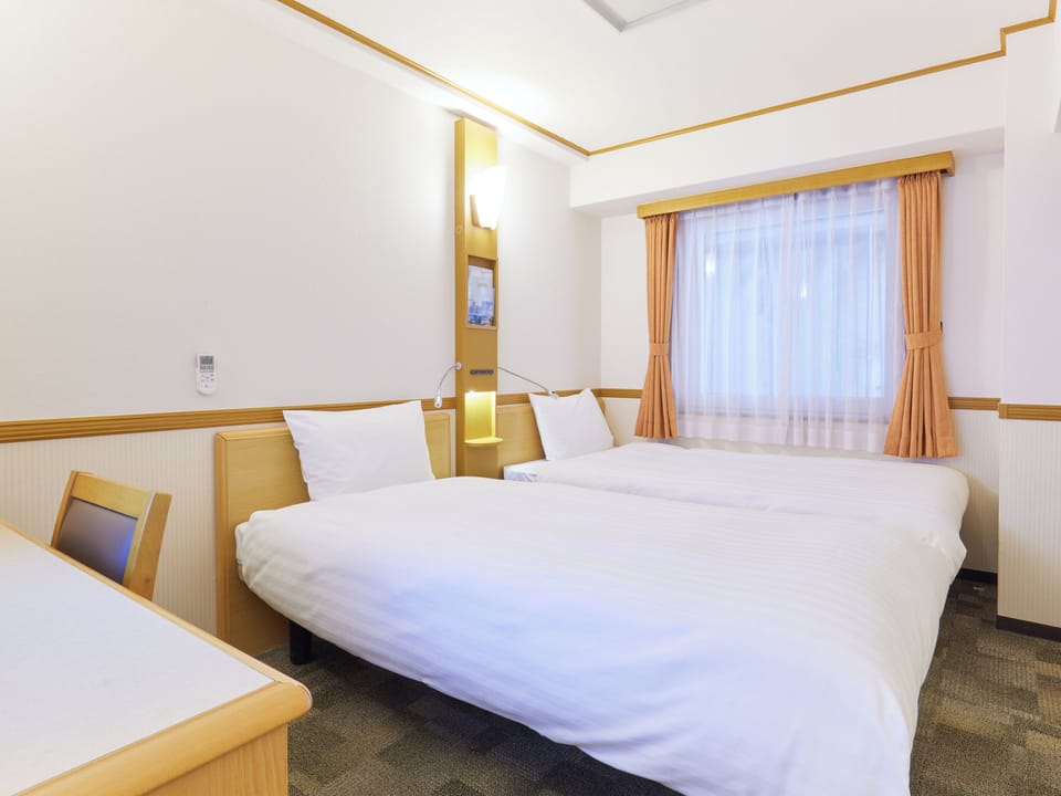 Desk, laptop workspace, free WiFi, bed sheets