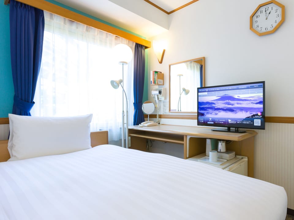 Desk, free WiFi, bed sheets