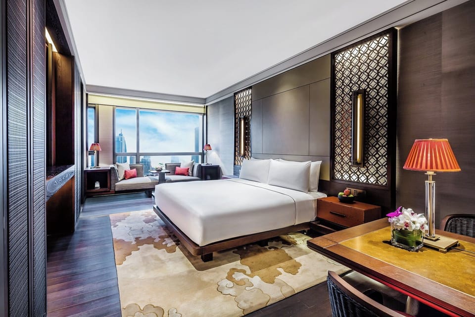 Premium bedding, down comforters, minibar, in-room safe