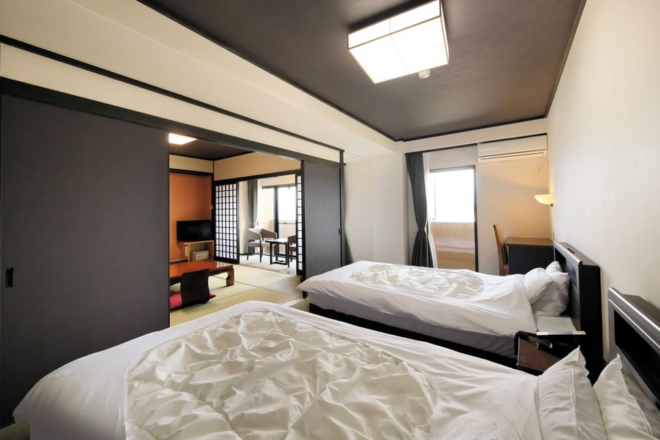 Superior Twin Room, Non Smoking (Japanese-Western Room) | In-room safe, desk, free WiFi, bed sheets