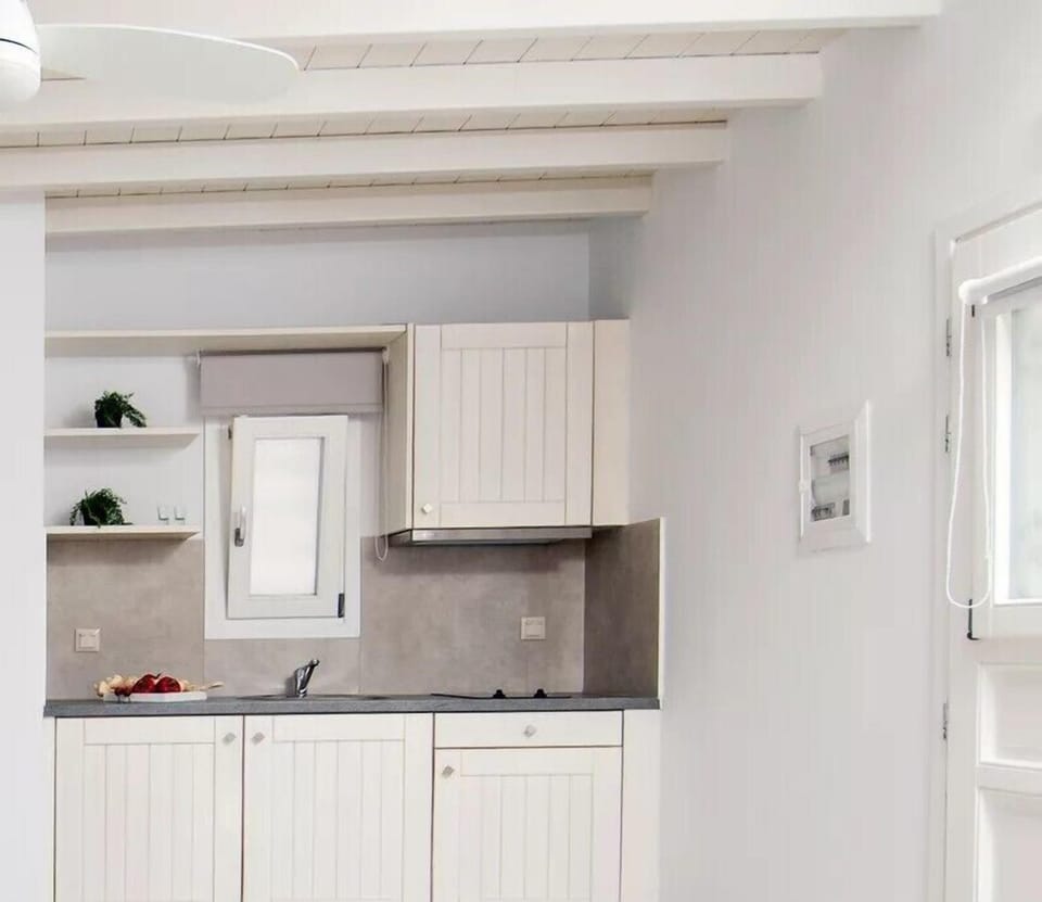 Quadruple Room, Sea View | Private kitchenette | Fridge, stovetop, espresso maker, coffee/tea maker