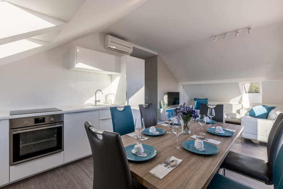 Luxury Penthouse, Sea View, Oceanfront | Living area | Flat-screen TV, toys