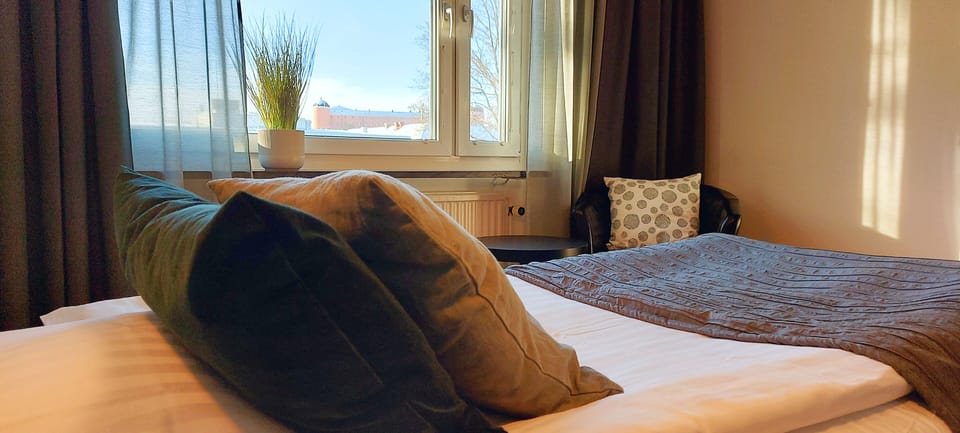 Desk, blackout drapes, iron/ironing board, free WiFi