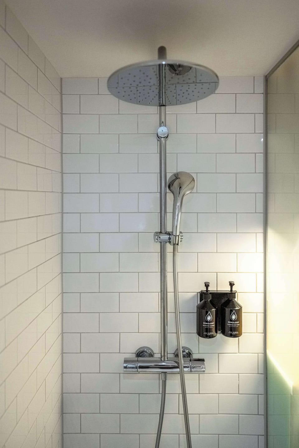 Shower, rainfall showerhead, designer toiletries, hair dryer