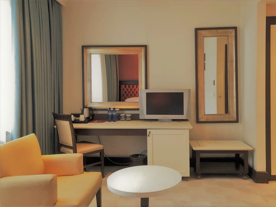 Economy Double or Twin Room, Non Smoking | Minibar, in-room safe, desk, iron/ironing board