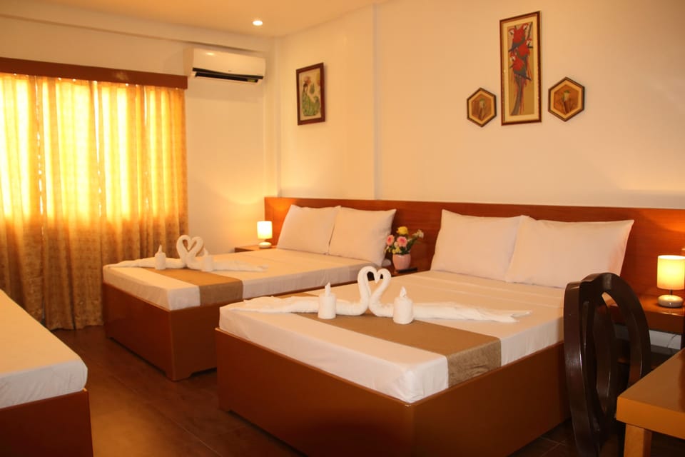 Family Single Room (Amelia) | Desk, blackout drapes, iron/ironing board (on request), WiFi (free)
