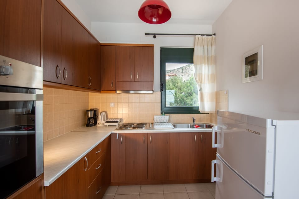 Junior Suite, 1 Bedroom, Sea View (2nd Floor A1/A2) | Private kitchen | Espresso maker, coffee/tea maker, fridge, stovetop
