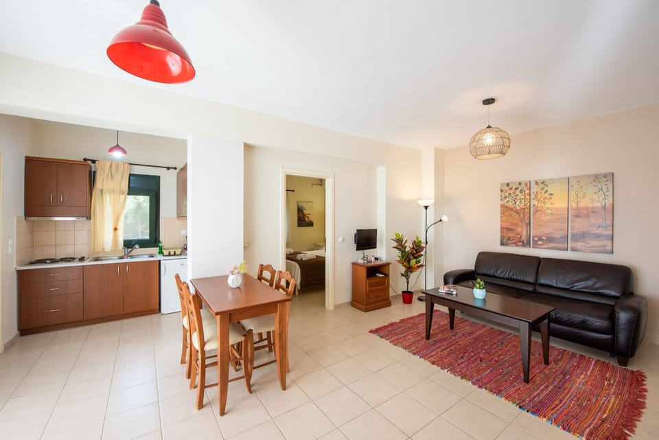 Economy Suite, 1 Bedroom, Partial Sea View, Ground Floor | Living area | 43-inch Smart TV with satellite channels