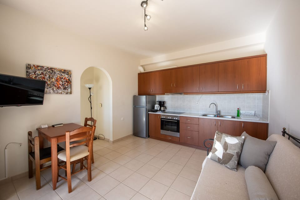 Economy Suite, 1 Bedroom, Ground Floor | Private kitchen | Espresso maker, coffee/tea maker, full-size fridge, oven