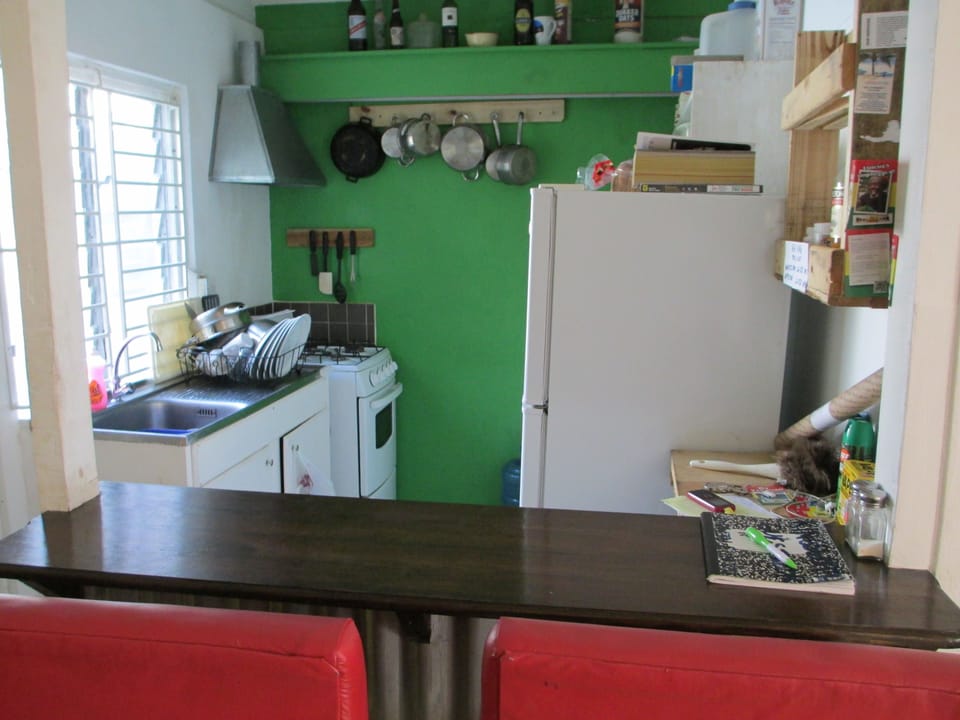 Economy Room, 1 Queen Bed, Private Bathroom | Private kitchen | Shared fridge, microwave