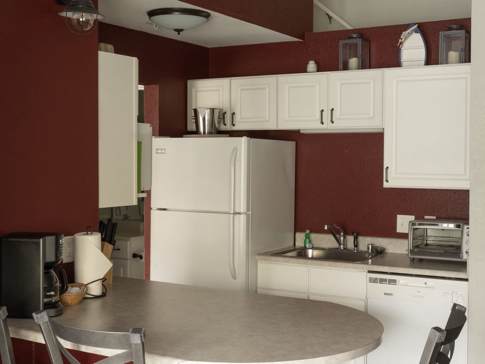 Standard Suite, 2 Bedrooms | Private kitchenette | Coffee/tea maker, full-size fridge, microwave, dishwasher