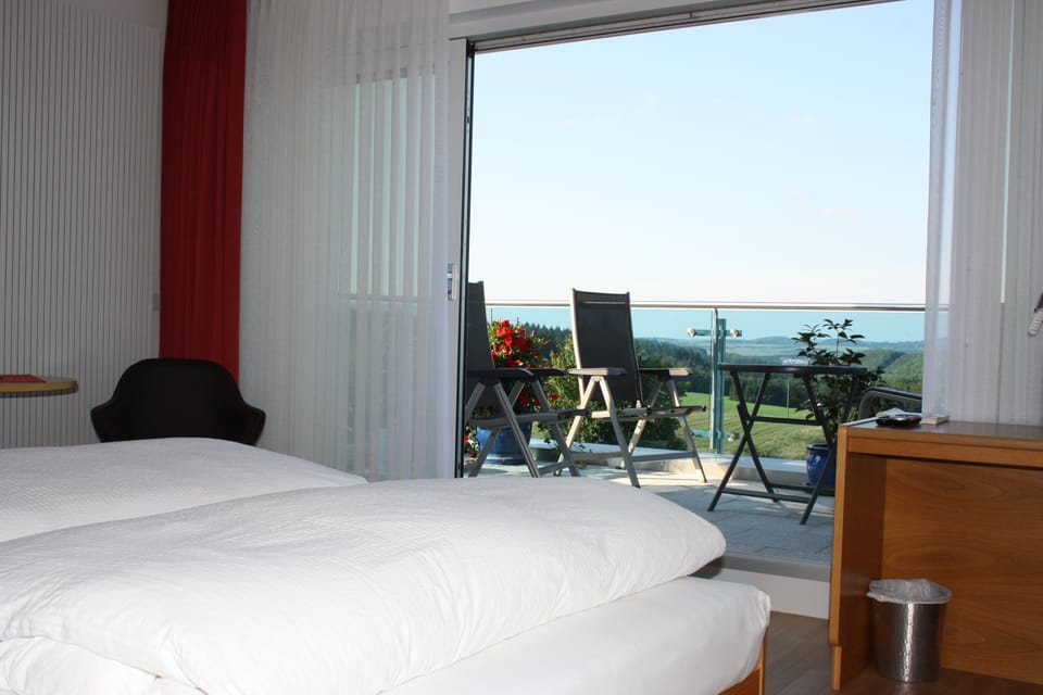 Comfort Triple Room, Balcony | In-room safe, desk, soundproofing, free cribs/infant beds