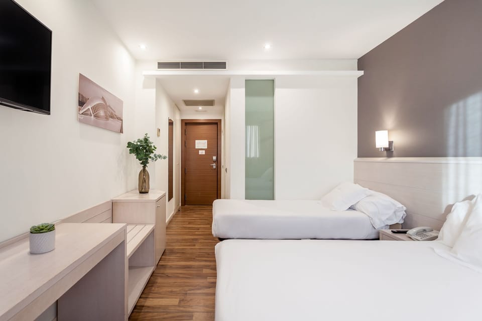 Triple Room | Premium bedding, minibar, in-room safe, desk