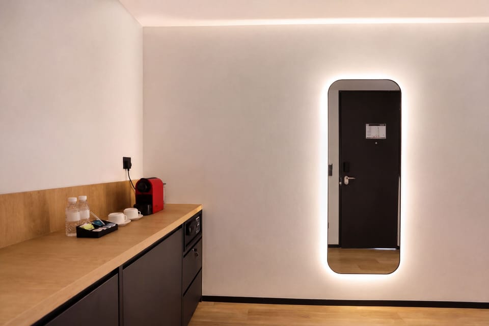 Terrace Room | Minibar, in-room safe, iron/ironing board (on request), WiFi (free)