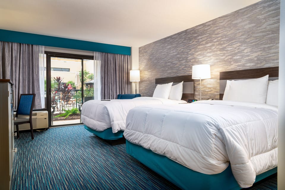 Double Deluxe Poolside | Premium bedding, desk, blackout drapes, iron/ironing board