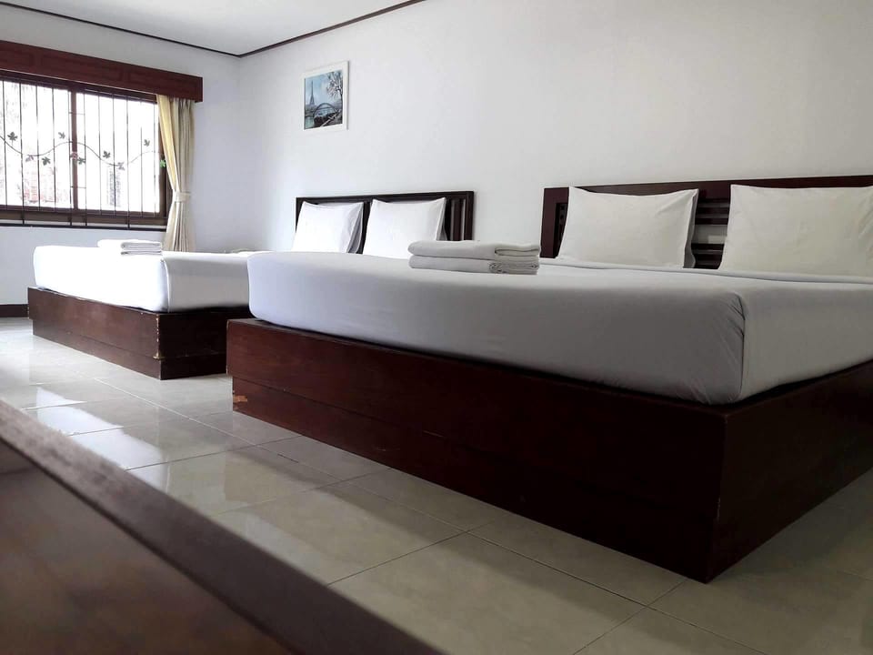Family Room | Minibar, blackout drapes, free WiFi