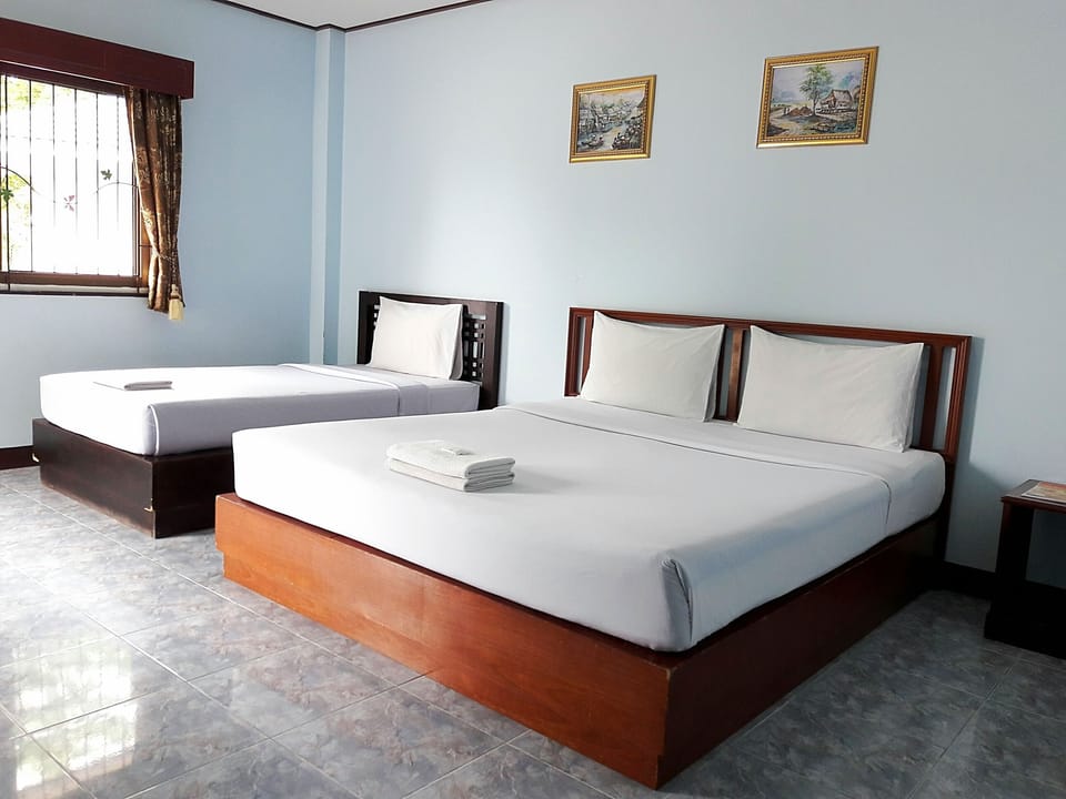 Standard Triple Room | Minibar, blackout drapes, free WiFi