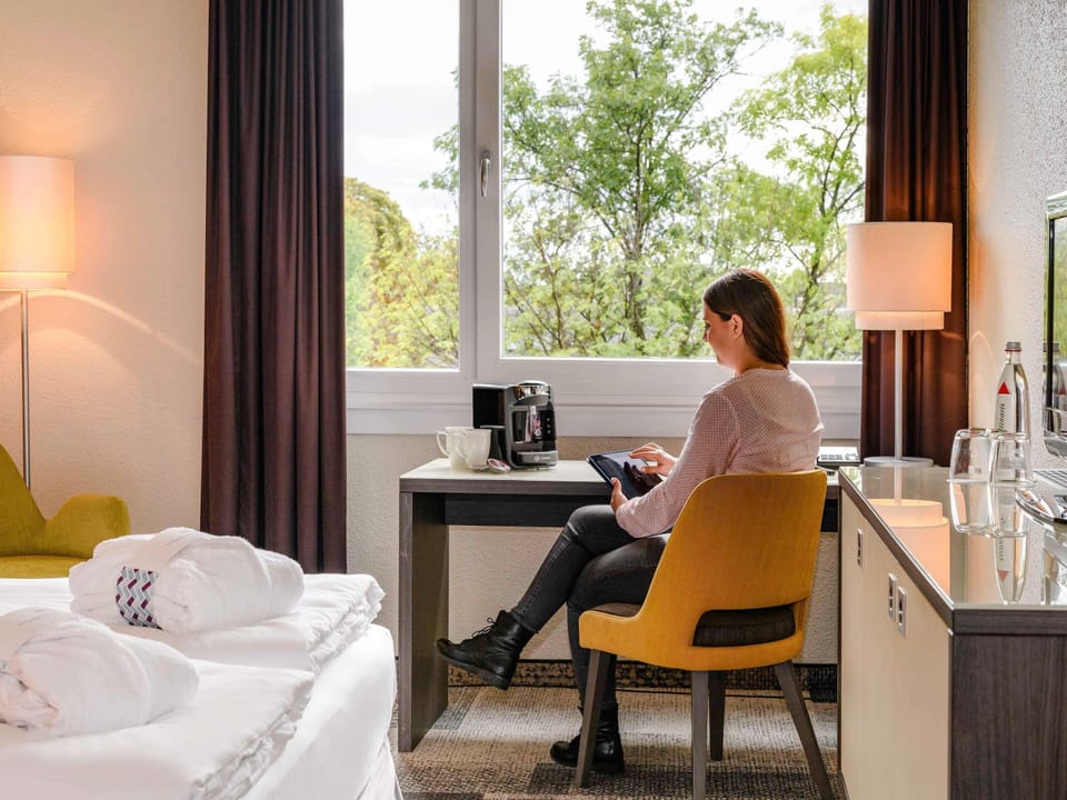 Premium bedding, down comforters, in-room safe, desk