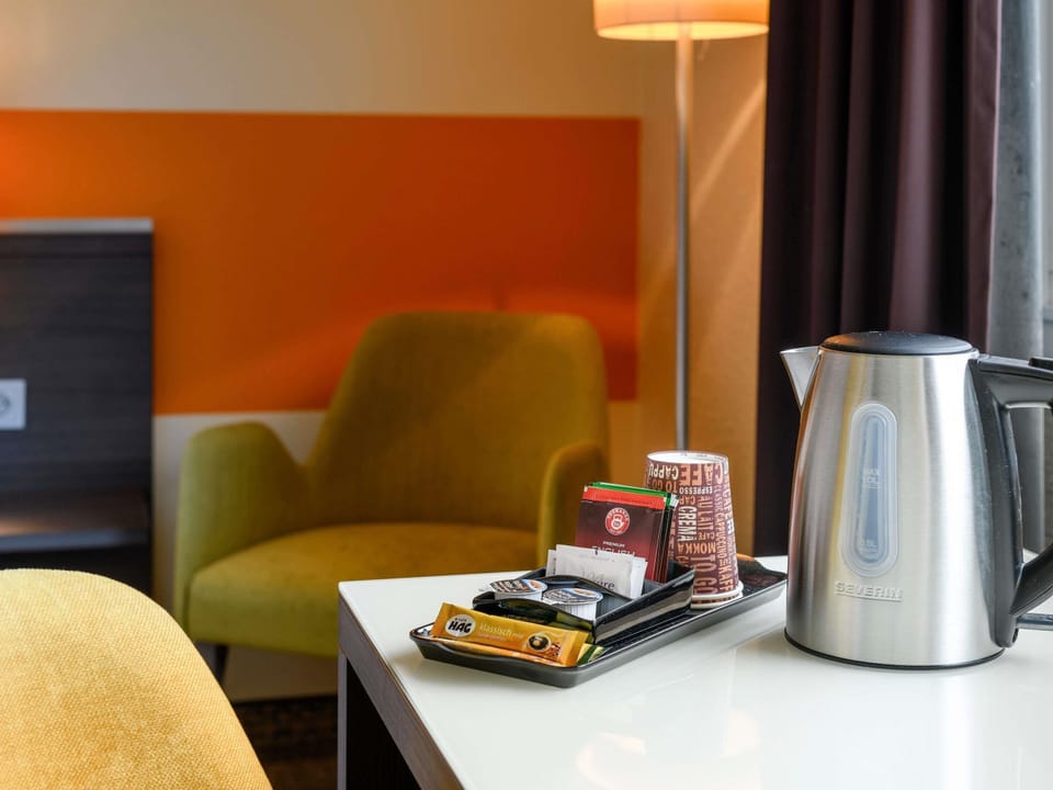Premium bedding, down comforters, in-room safe, desk