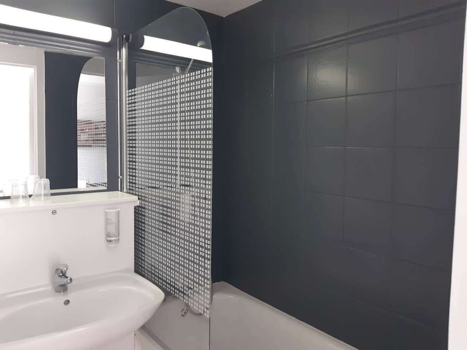 Desk, blackout drapes, soundproofing, free WiFi