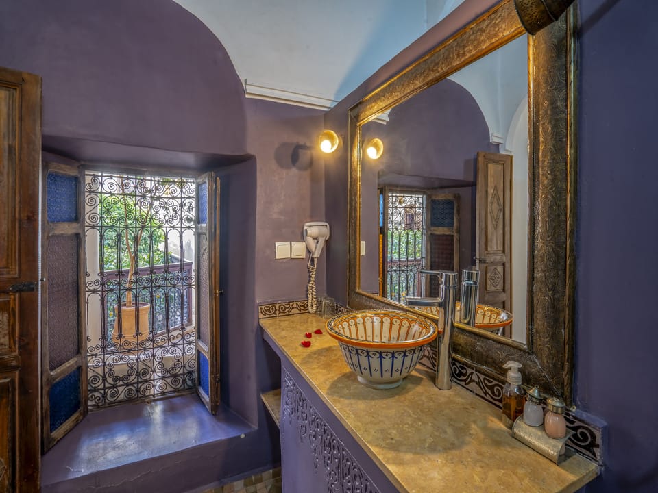 Shower, free toiletries, hair dryer, bathrobes