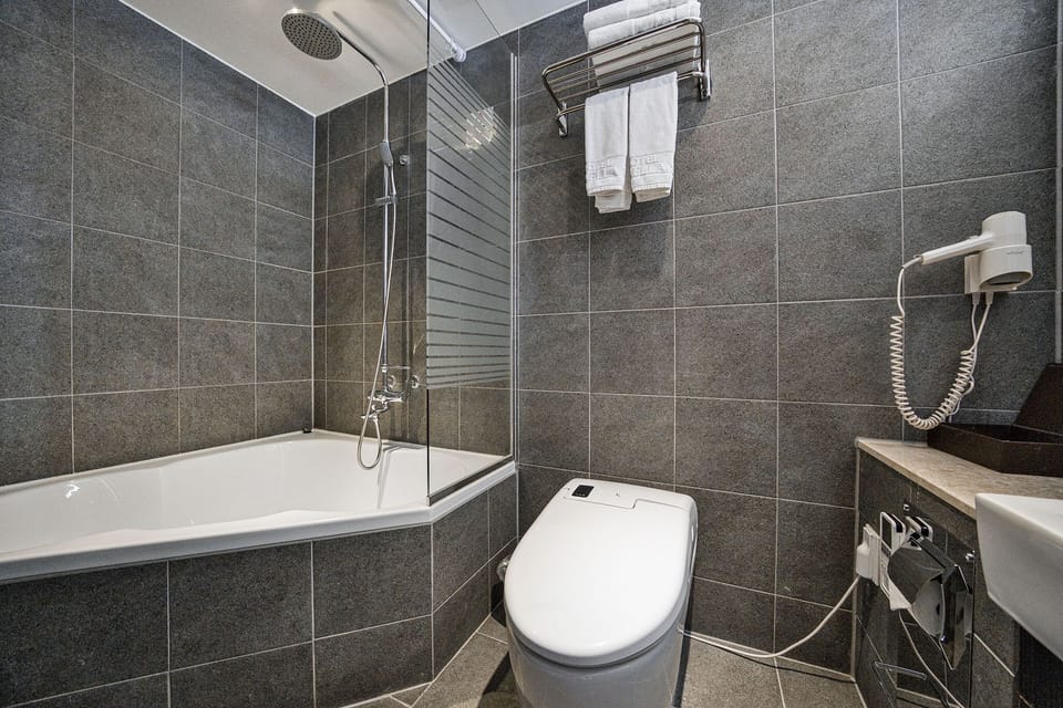 Suite | Premium bedding, free minibar items, desk, blackout drapes