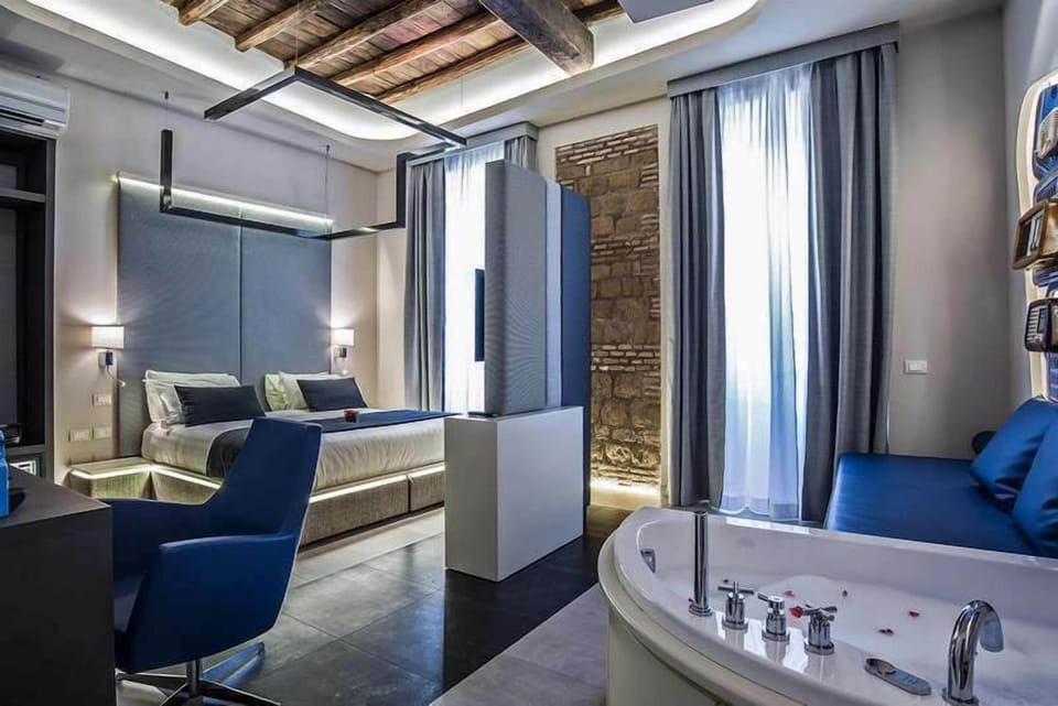Superior Triple Room | Minibar, in-room safe, desk, soundproofing